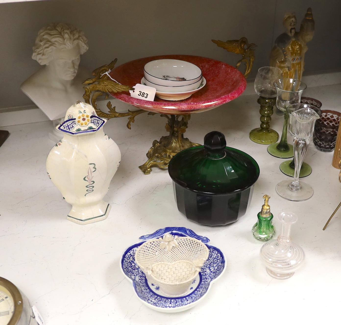 A French ruby lustre and ormolu mounted centrepiece, a green faceted glass bowl and cover, two Nymphenburg dishes, a pearlware dessert dish and other ceramics and glass